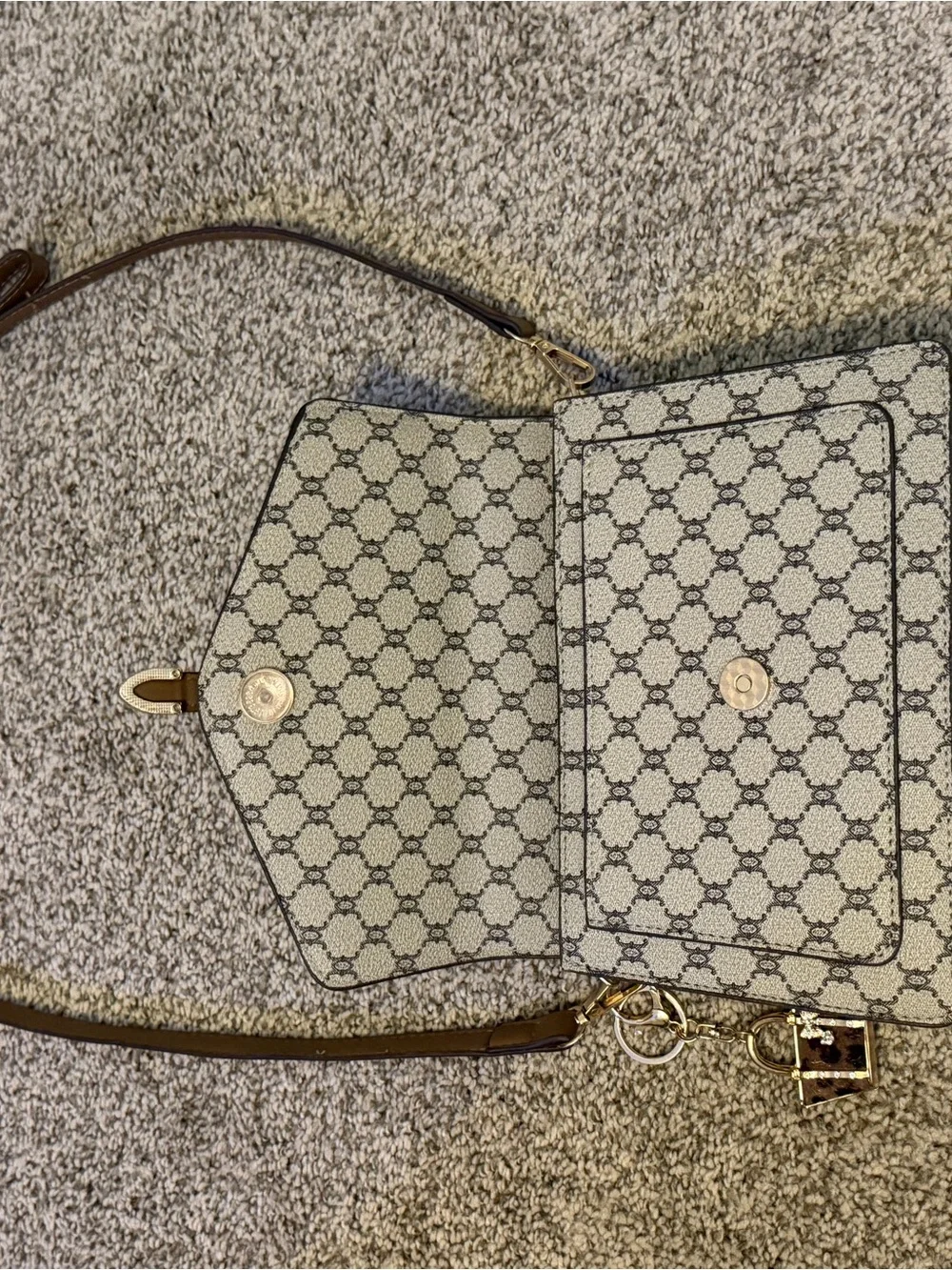 Beige Brown Monogram Shoulder Bag with Gold Buckle with a matching wallet.